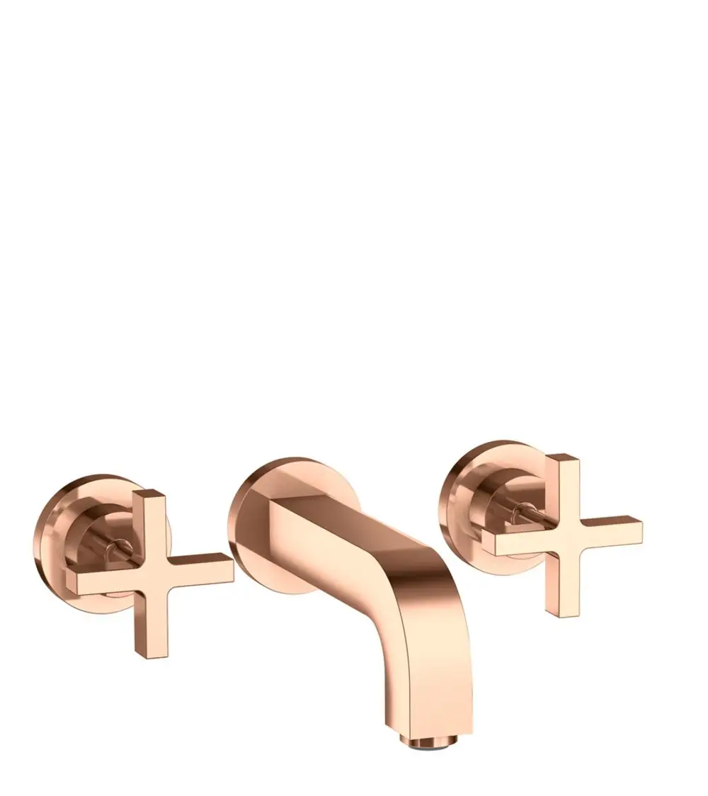 Waschtischarmatur mit Kreuzgriffen und Auslauf, montiert an der Wand. Oberfläche in Polished Red Gold. Design von AXOR.